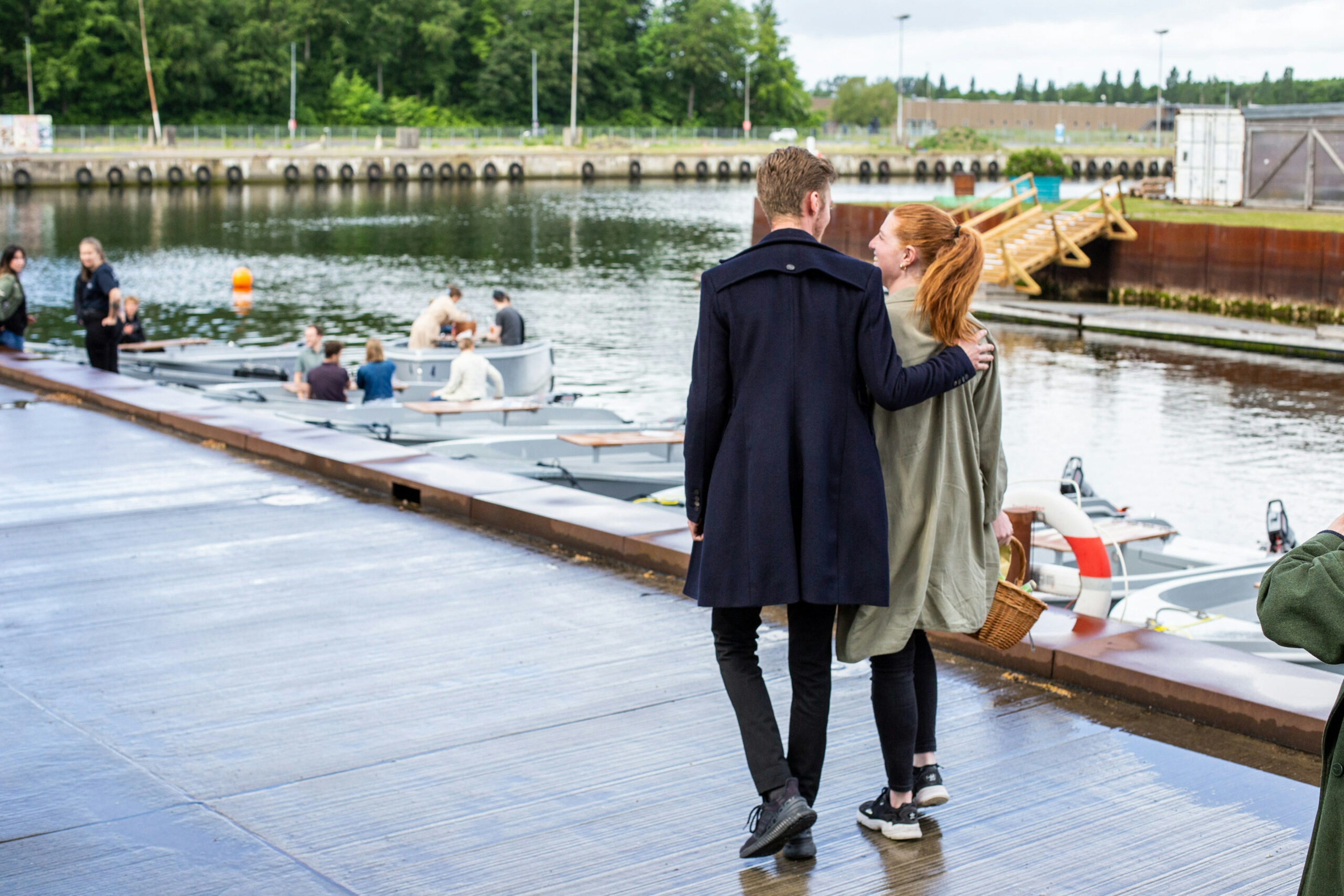 GoBoat odense a couple walking to boats - Andrew Rogala