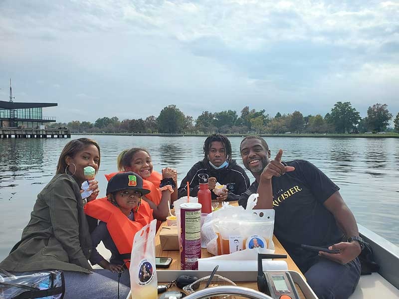 Friends having fun on the waters of Copenhagen GoBoat
